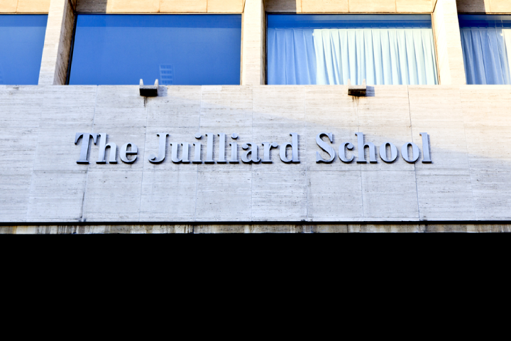 The front facade of the Juilliard School in New York City at Lincoln Center.