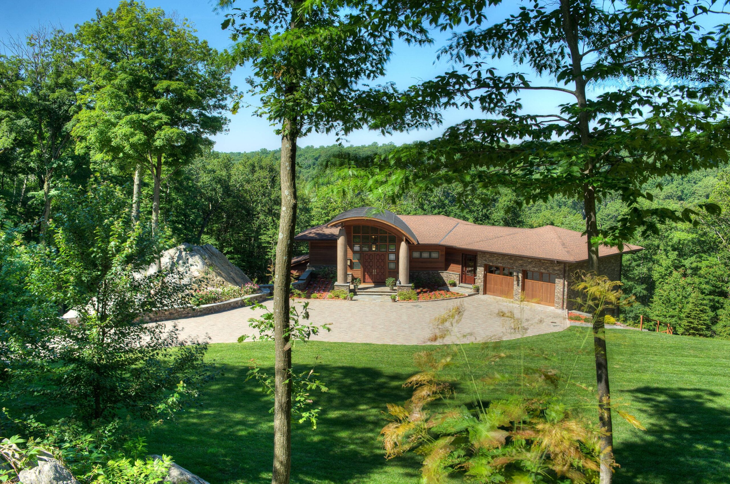 The Art Lux home is your chance to own a unique hillside house near New York City