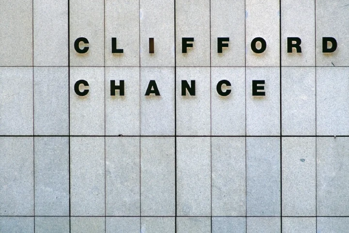 The logo of the law firm Clifford Cance on the facade of a skyscraper
