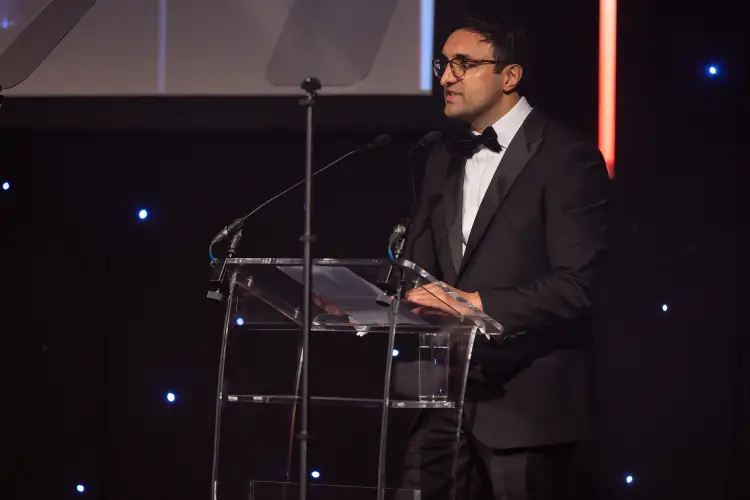 Ajaz Ahmed at the podium of the Spear's Awards