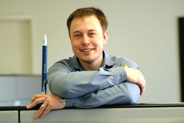 Elon Musk in 2004 wearing a blue shirt and a watch on his left wrist