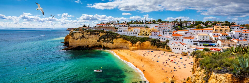 View of Carvoeiro fishing village with beautiful,Beach in Algarve, Portugal.