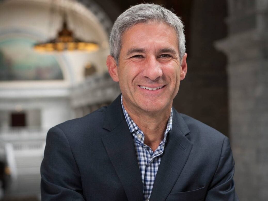 Headshot of Joshua Kanter smiling and looking at the camera