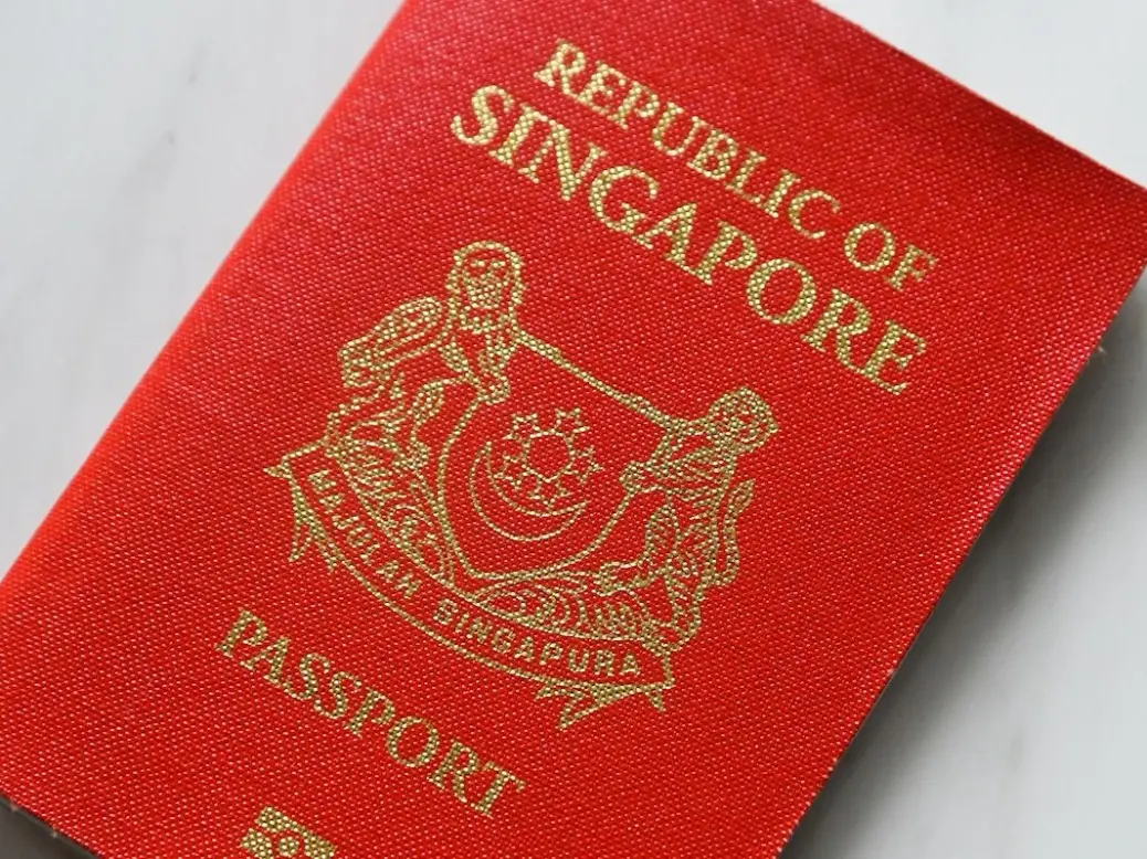 A close-up of a Singapore passport