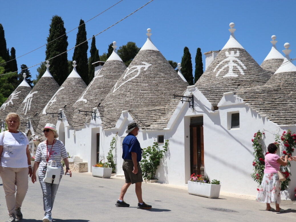A general view of Alberobello's trulli houses, a traditional Apulian dry stone hut with a conical roof, in the Metropolitan City of Bari, Apulia region, Italy on June 01, 2022. Alberobello, a small town listed as one of the three important places in the UNESCO World Heritage List, continues to attract the attention of tourists with its unique houses. (Photo