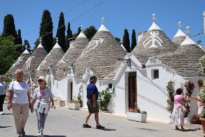 A general view of Alberobello's trulli houses, a traditional Apulian dry stone hut with a conical roof, in the Metropolitan City of Bari, Apulia region, Italy on June 01, 2022. Alberobello, a small town listed as one of the three important places in the UNESCO World Heritage List, continues to attract the attention of tourists with its unique houses. (Photo