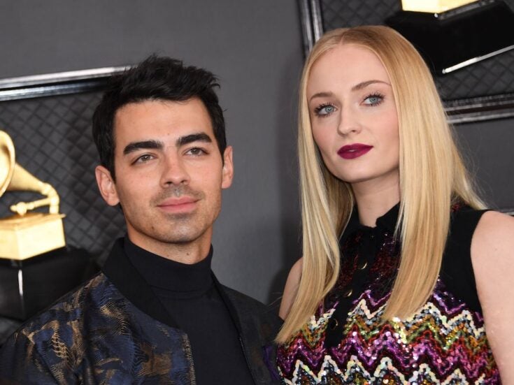 British actress Sophie Turner and her husband US singer Joe Jonas arrives for the 62nd Annual Grammy Awards on January 26, 2020, in Los Angeles. (Photo by VALERIE MACON / AFP) (Photo by VALERIE MACON/AFP via Getty Images)