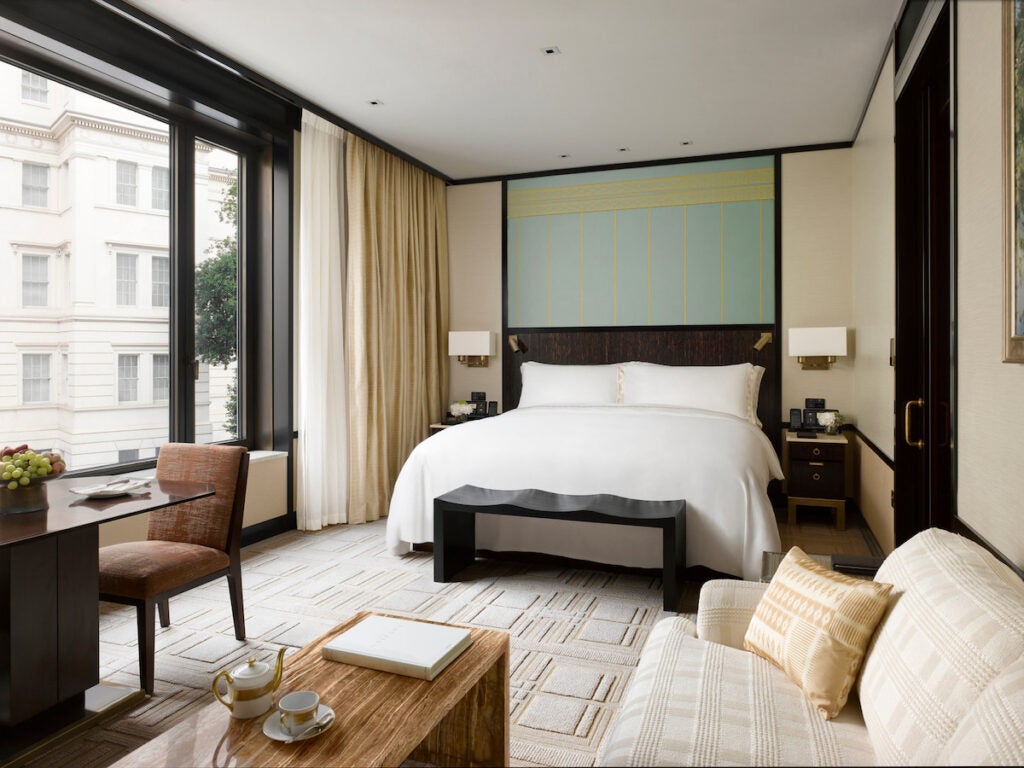 A bedroom overlooking Belgravia at the Peninsula London