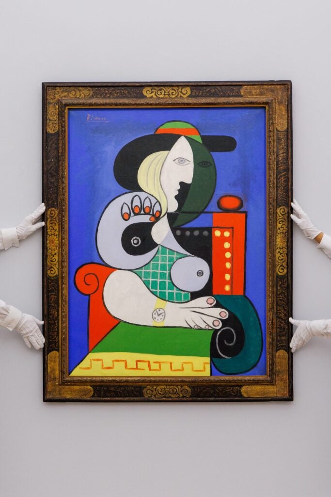 LONDON, ENGLAND - OCTOBER 06: Pablo Picasso’s Femme à la montre, from 1932, the artist’s ‘golden year’ goes on view at Sotheby's on October 06, 2023 in London, England. The painting is on view to the public in London until 11 October at Sotheby’s. Estimated to realise in excess of $120m when it is offered at auction in New York this November, the work is one of the most valuable paintings ever to come to the market. (Photo by Tristan Fewings/Getty Images for Sotheby's)