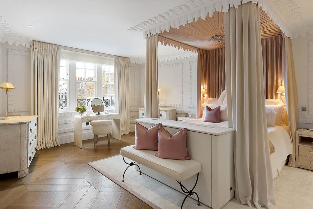 A bedroom in a Georgian townhouse in London listed by Sotheby's International Realty