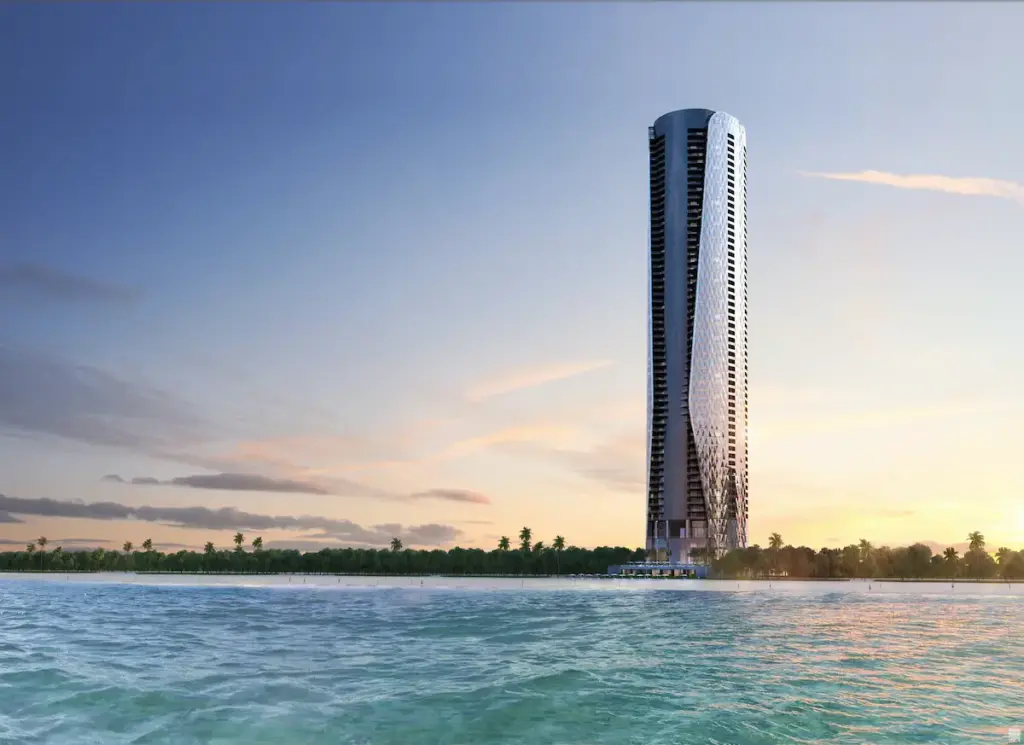 A rendering of the Bentley tower in Miami Beach on the waterfront. It is a tall think cyclincar tower.