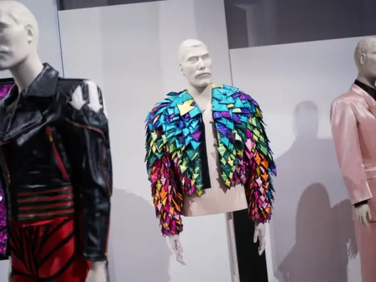 Mannequins wearing Freddie Mercury costumes