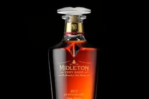 Bottle of Midleton with rubies in a gold collar