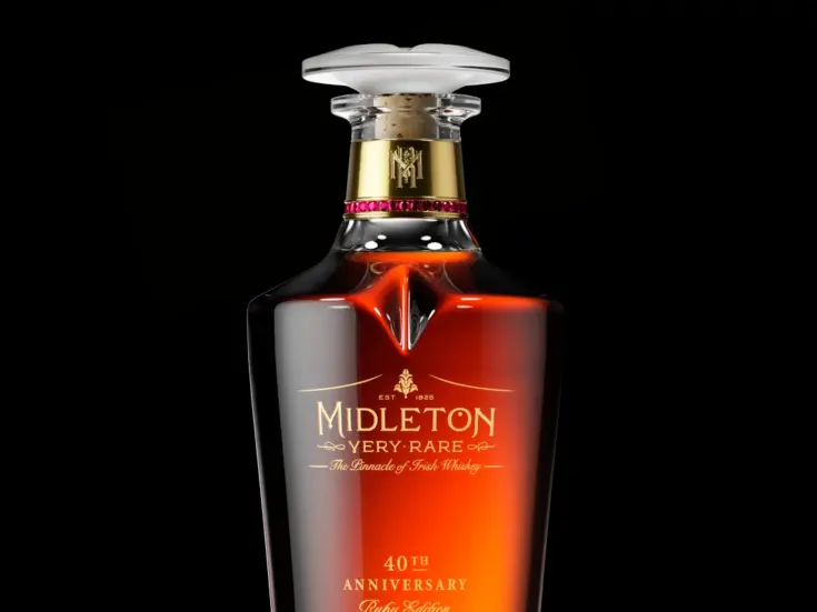 Bottle of Midleton with rubies in a gold collar