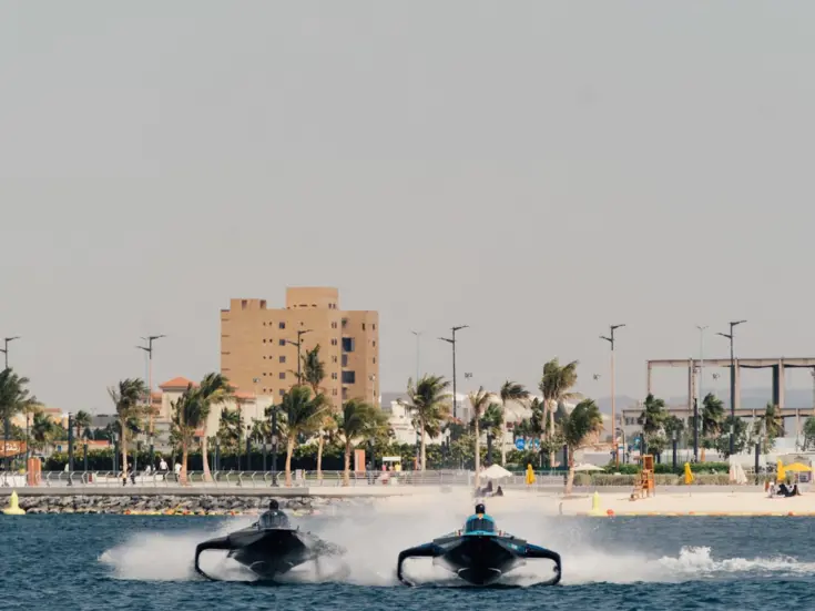 Two e-boats racing on the sea during the E1 race in Jeddah
