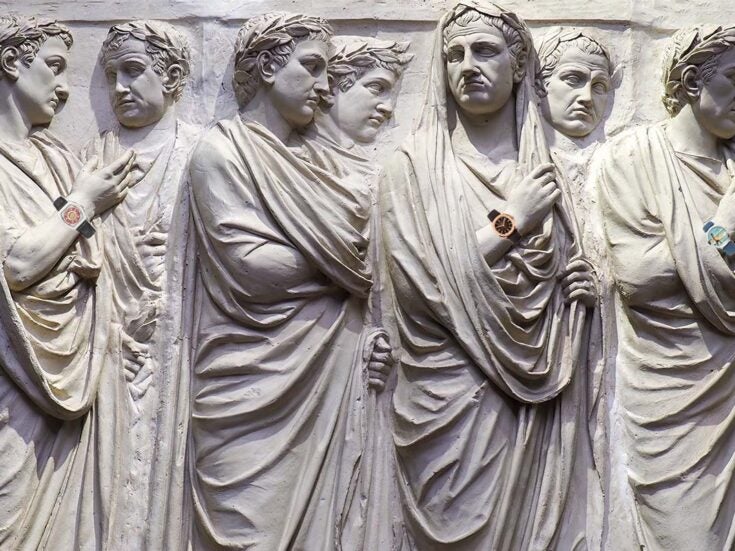 Composite image showing Roman statues wearing luxury watches