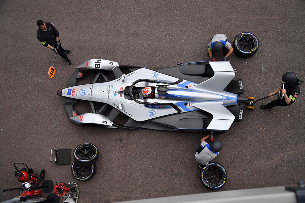 A Formula E car is readied for action